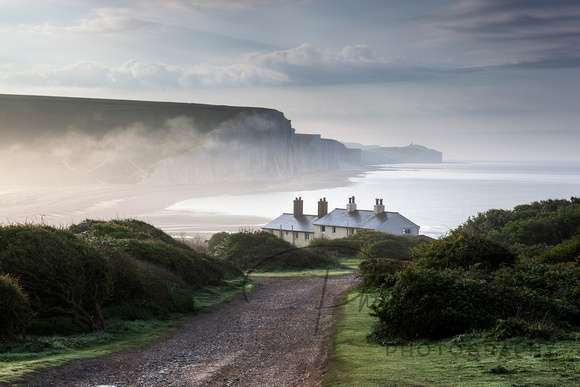 Mist clearing over the Coastguard Cottages at Cuckmere Haven