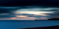 Newhaven lighthouse from Seaford beach at Twilight - long exposure-panoramic